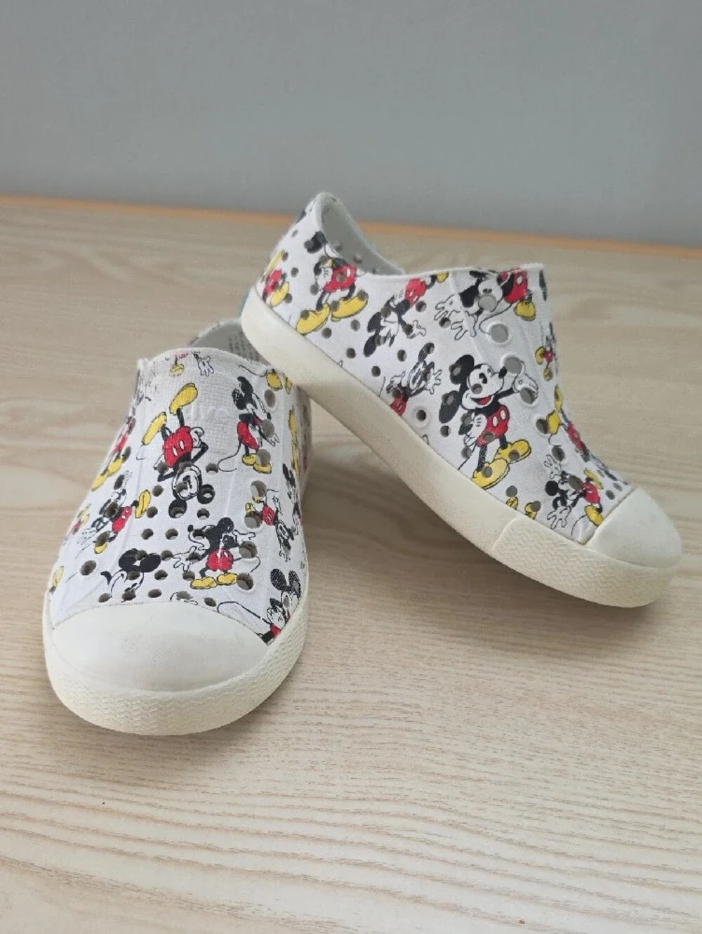 Native Shoes Kids White Slip-On Sneakers with Red & Yellow Mickey Print
